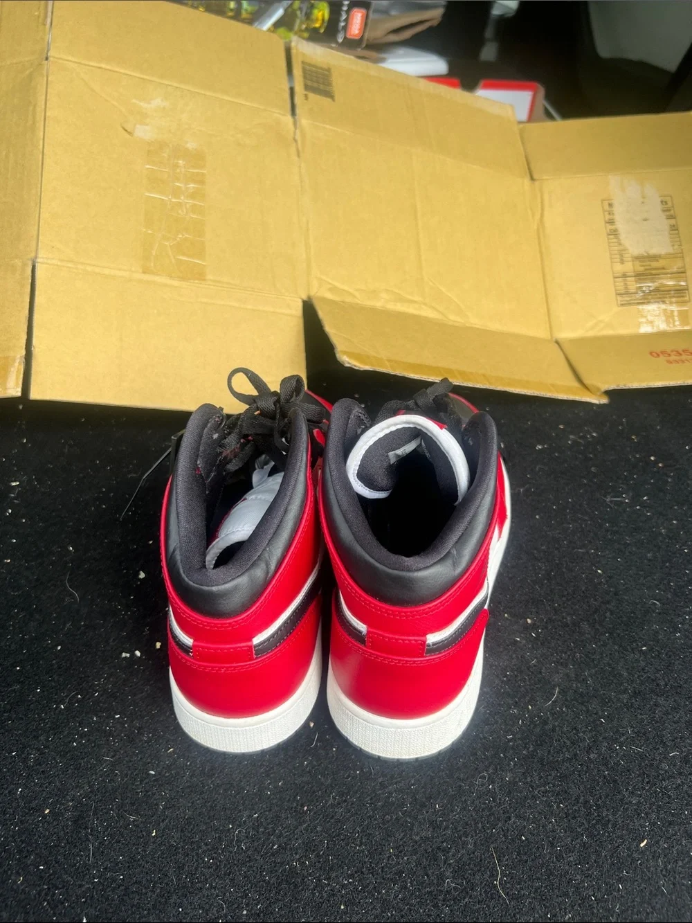 Nike Kids Red Black White Mid-Top Sneakers with Black Swoosh